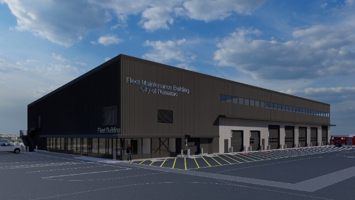 Large industrial Fleet Maintenance Building with multiple garage bays and office windows.