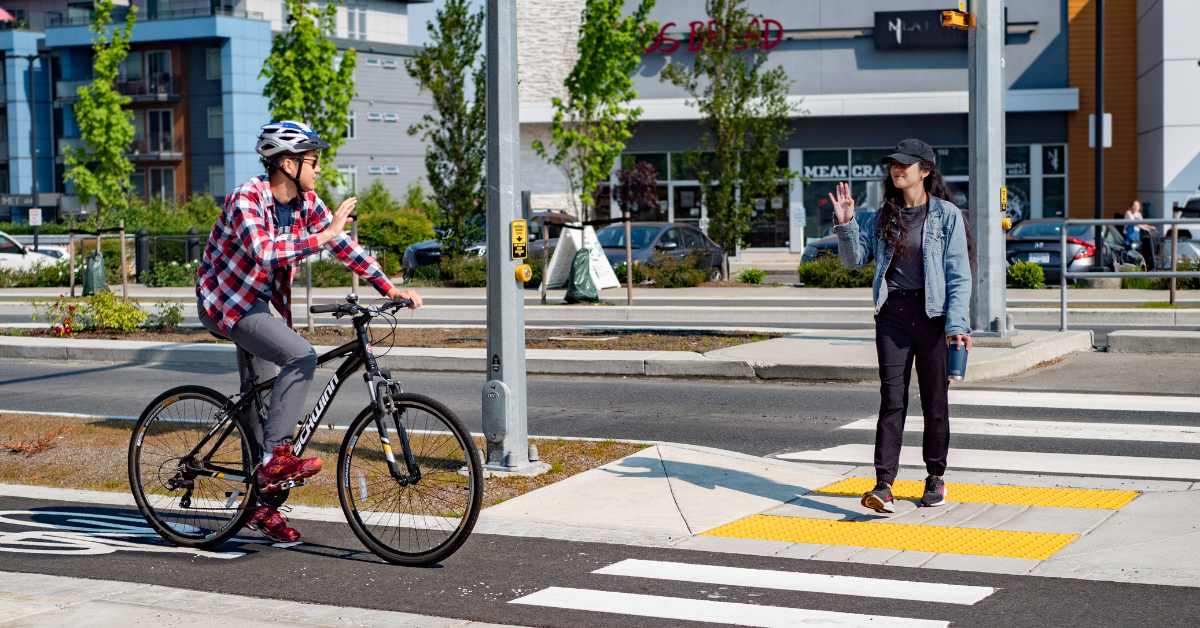 Pedestrians crossing the road on a crosswalk