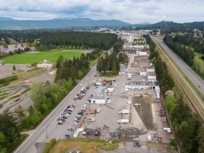 Aerial of the public works yard with highway 19 to the right, Beban Park to the left and Mount Benson in the distance.